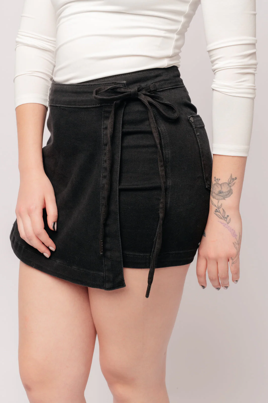 Bentli High Rise Side Tie Denim Skort in Black - Image 15