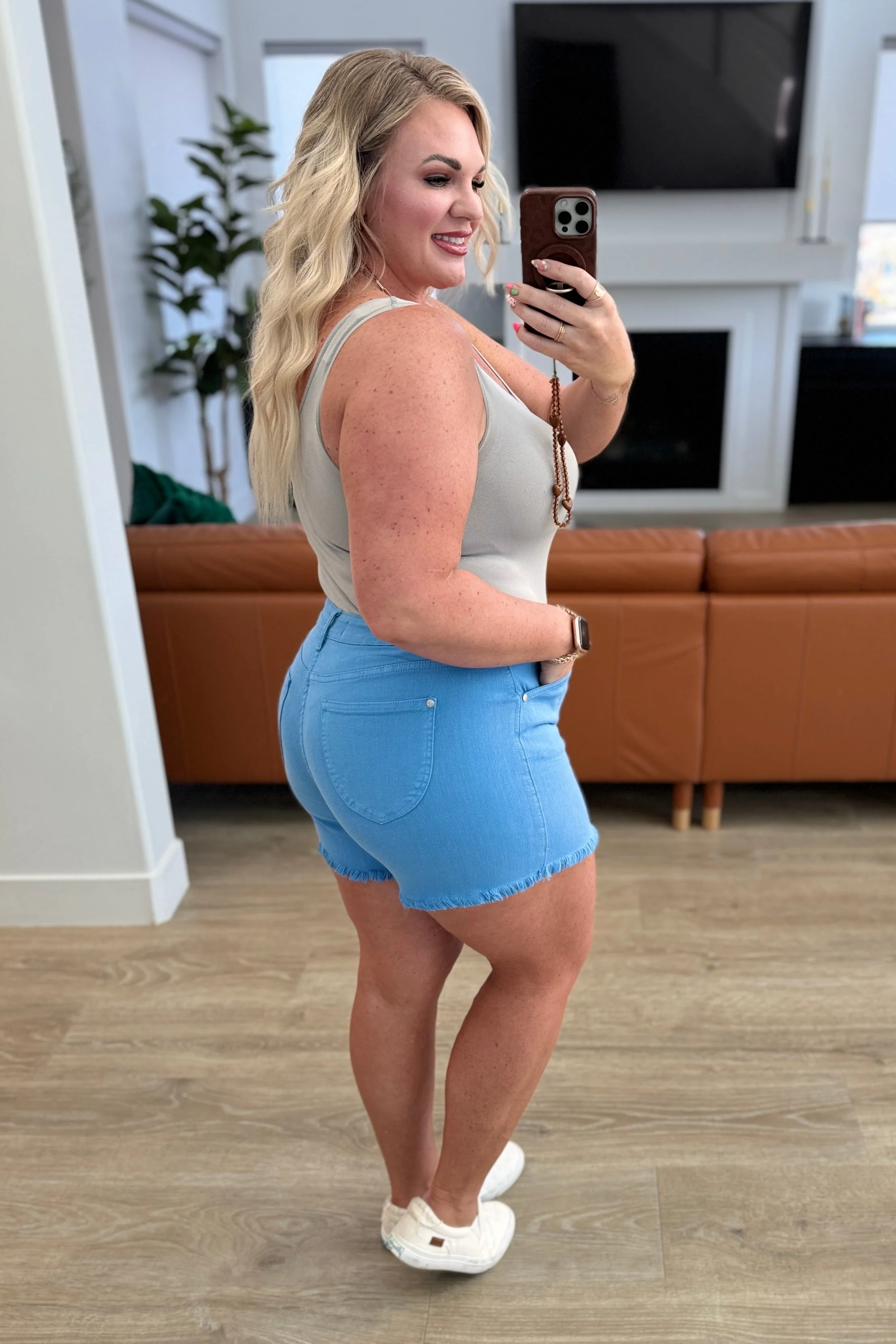 Celeste Mid Rise Shield Pocket Cutoff Shorts in Sky Blue - Image 13