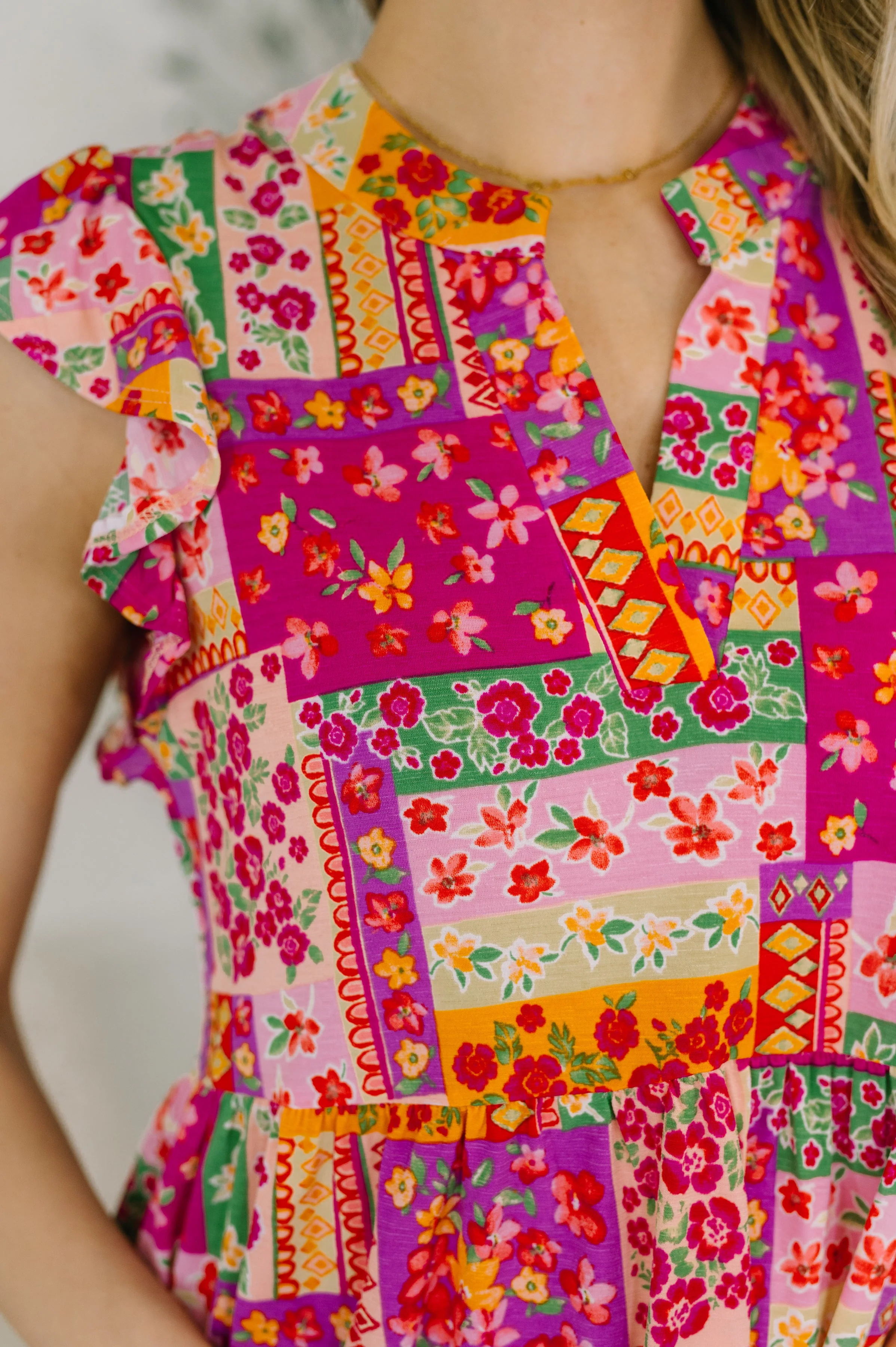 Lizzy Flutter Sleeve Dress in Patchwork Floral - Image 2