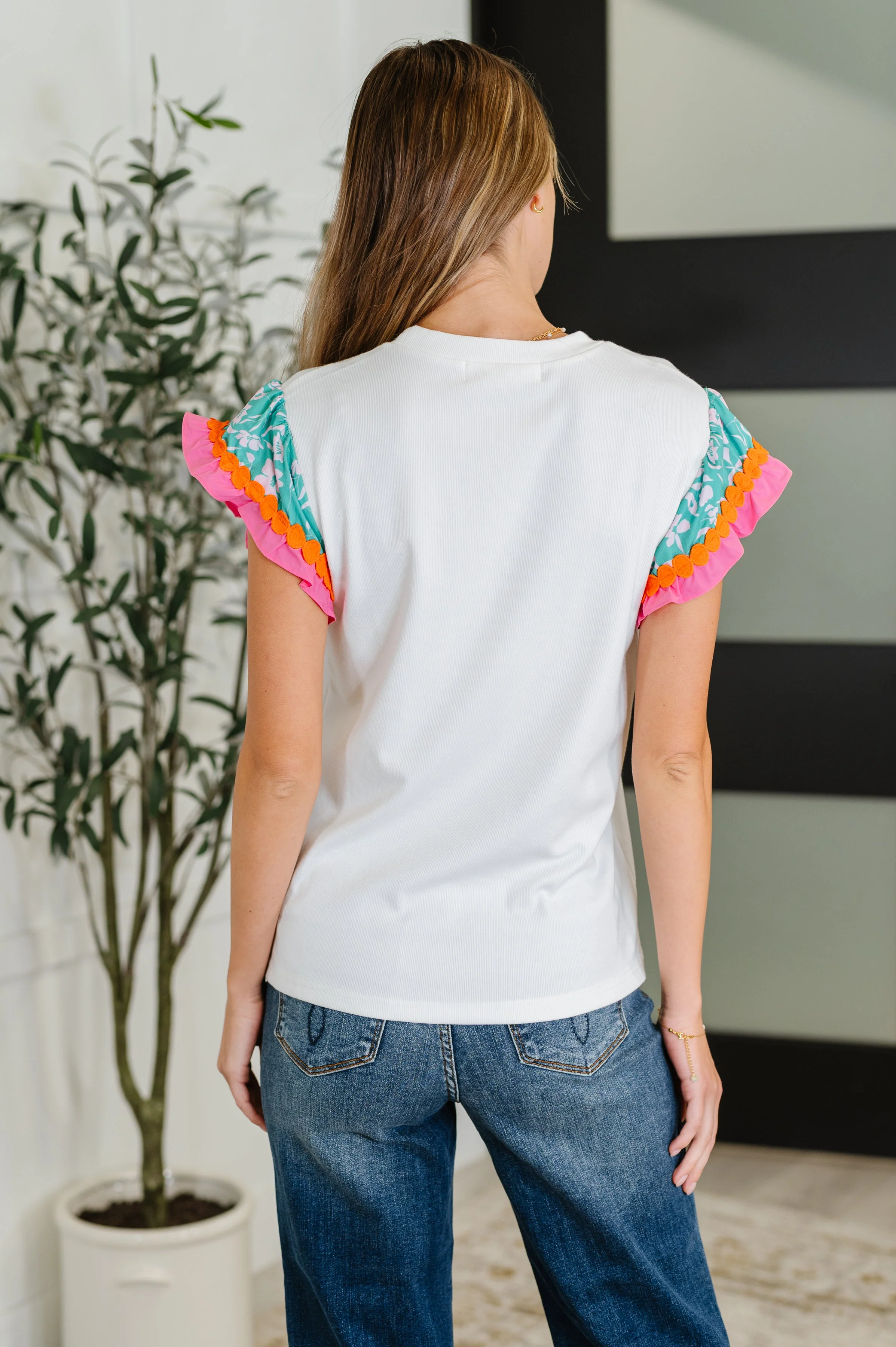 Petals & Poise Floral Flutter Sleeve Top in White - Image 5